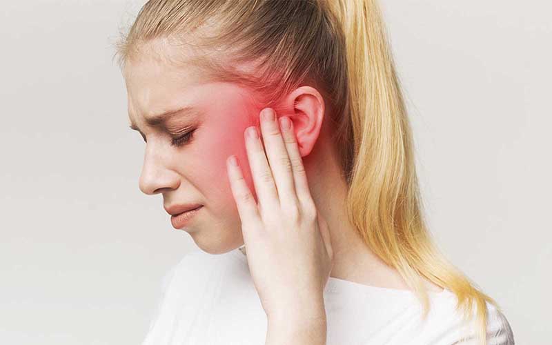 Sick Female Having Ear Pain, Touching Her Pain